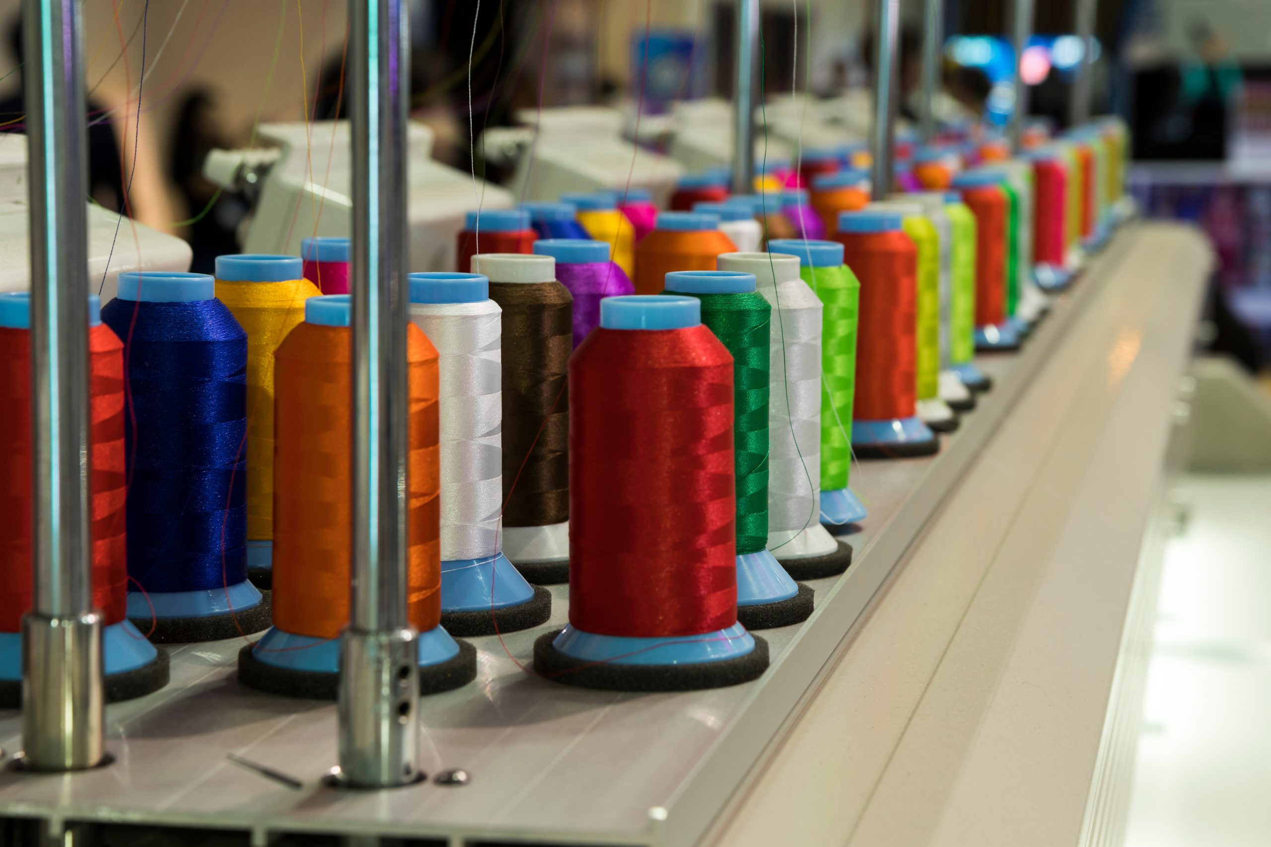 stock-photo-industrial-embroidery-machine-for-create-patterns-on-textiles-1223509240